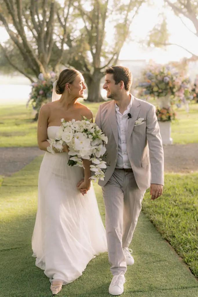 The bride in her gown by Vera Wang and the groom in Boss. (Photo by Joseph West Photography)