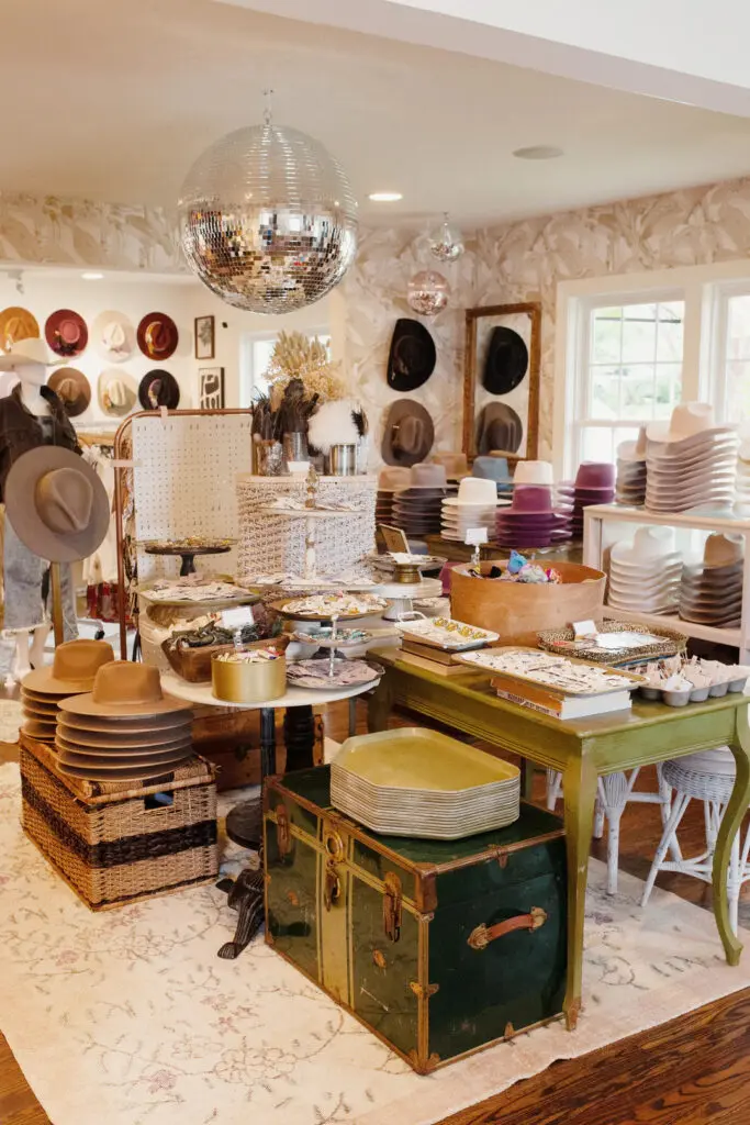 The hat bar offers a diverse selection of vintage, handmade and one-of-a-kind accessories for hats, including "scarves, pins, bling, playing cards, vintage matchbooks, feathers, dried florals and more!" (Photo courtesy of Flea Style)