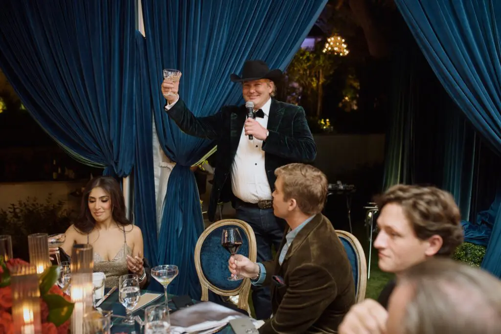 Pete Bell toasts the 80 guests attending his 55th birthday party at his posh home at 1069 Kirby Drive. 