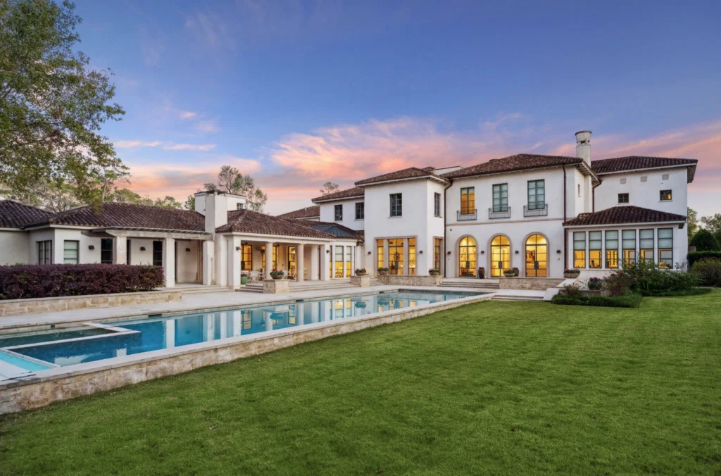 The home at 119 Carnarvon Drive sits amid two carefully landscaped acres.