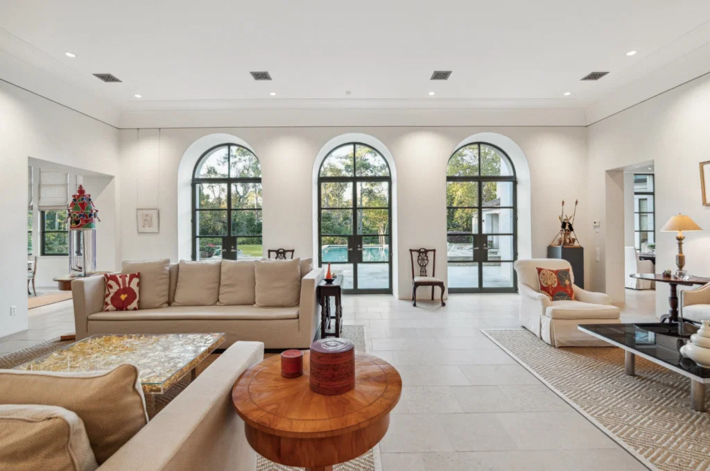 The living room at 119 Carnarvon Drive boasts Venetian plaster walls and Lueders limestone tile flooring. (Photo by TK Images)