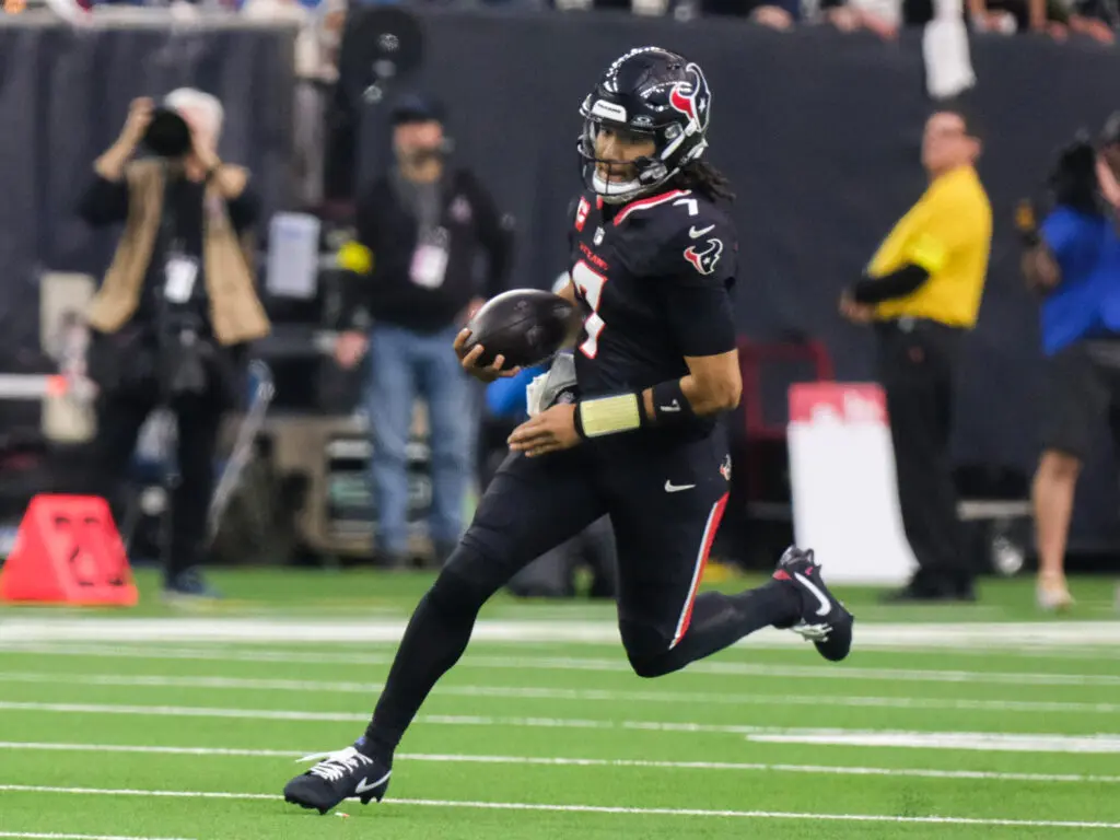 Houston Texans quarterback C.J. Stroud  can change games with his legs too. (Photo by F. Carter Smith)