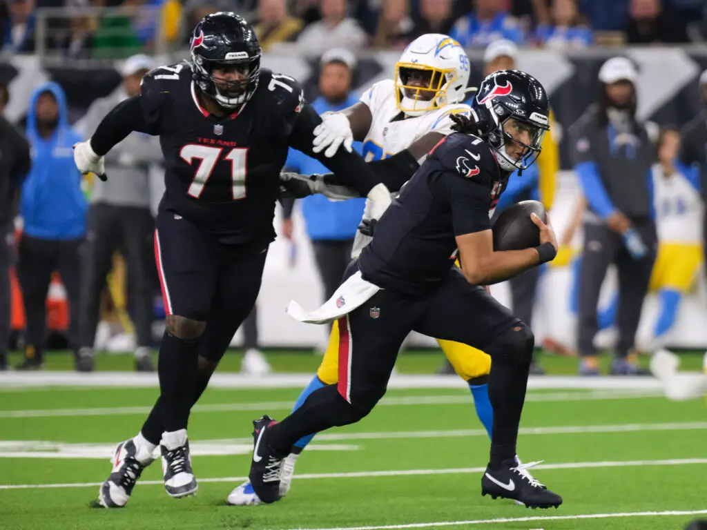 Houston Texans quarterback C.J. Stroud burst into the open field when his team needed yards the most. (Photo by F. Carter Smith)