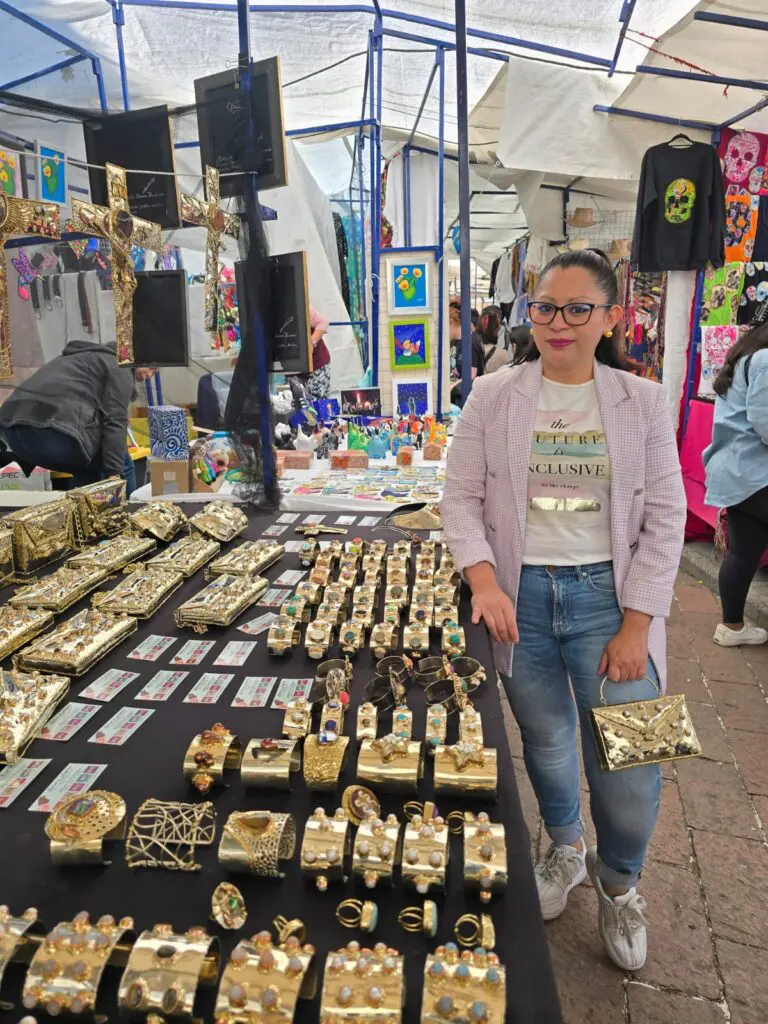 Gabriela Torres Zaragoza, owner and artisan, at her booth in San Ángel Market in México City. She continues the family tradition started 37 years ago. (Photo courtesy Gabriela Torres Zaragoza)