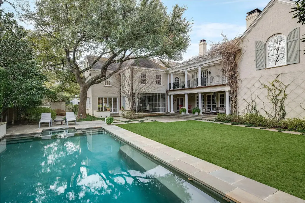 The backyard oasis at 4226 Arcady Avenue includes a glimmering pool. (Photo by Allie Beth Allman & Associates)