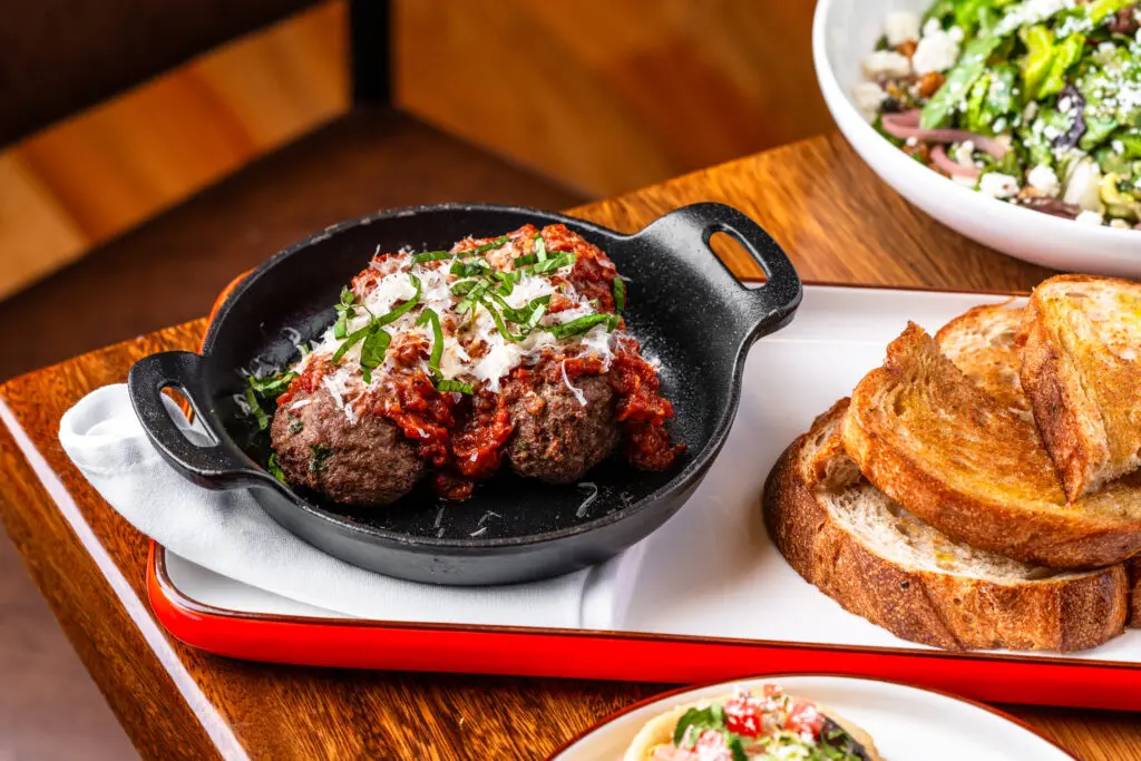The bison meatballs at HG Sply Co. are a must-try starter. (Photo by Estave Creative)