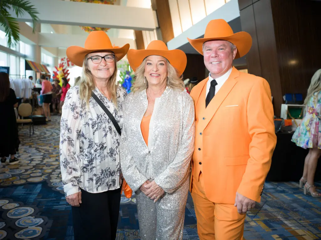 Charity Stone, Lisa Schutzenhofer, David Stone at the 25th annual Trailblazers luncheon. (Photo by Daniel Ortiz)