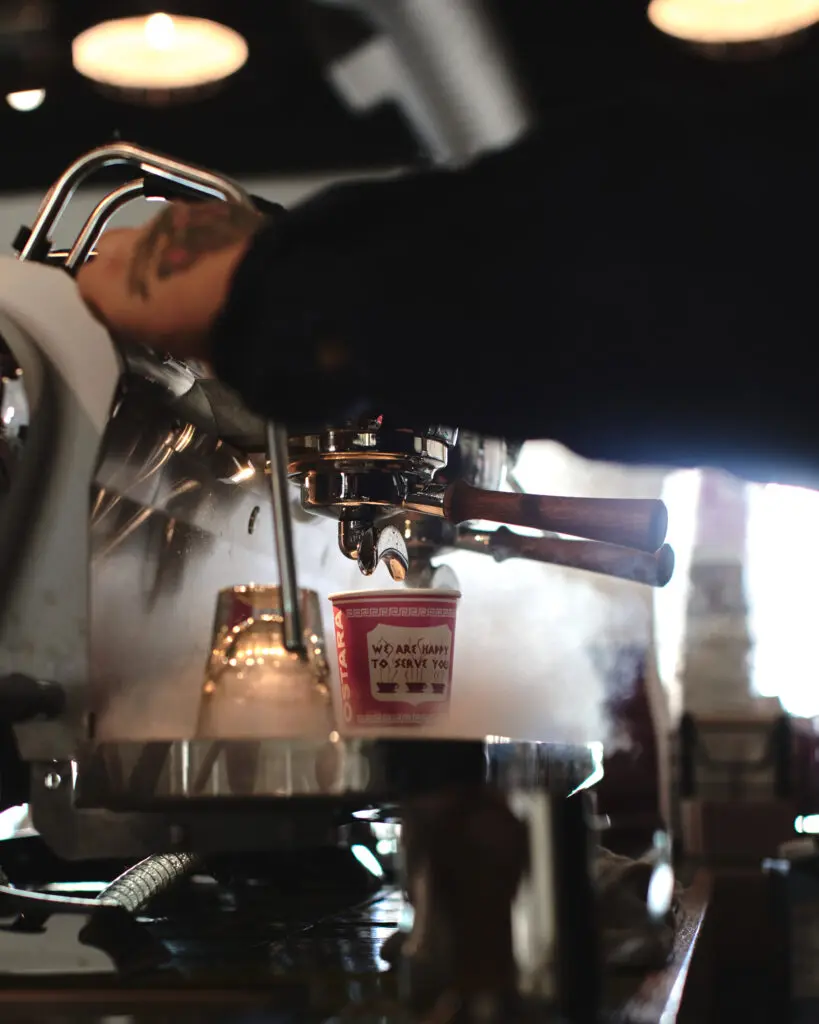 Step up to Ostara's green-tiled barista counter where you can order a signature coffee. (Photo by Proxii Media)
