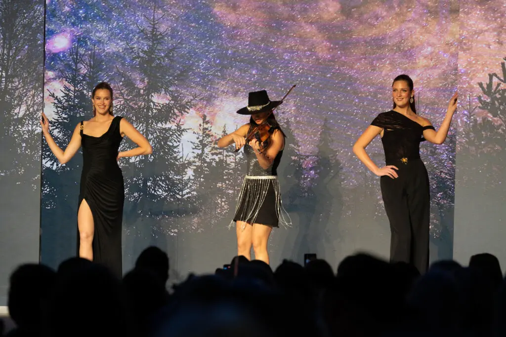 Electronic violinist Ruby Jane leads the Saks Fifth Avenue presentation at the 25th annual Trailblazers luncheon. (Photo by Daniel Ortiz)