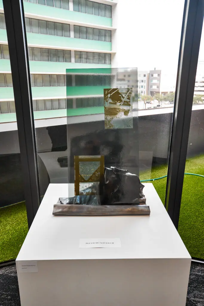 An installation view of "The Architecture of Culture: Works from the Guess Lawson Collection" on view at Gensler Houston headquarters. Pictured: Charisse Pearlina Weston's "Glass Protest" (Courtesy the Guess Lawson Collection)
