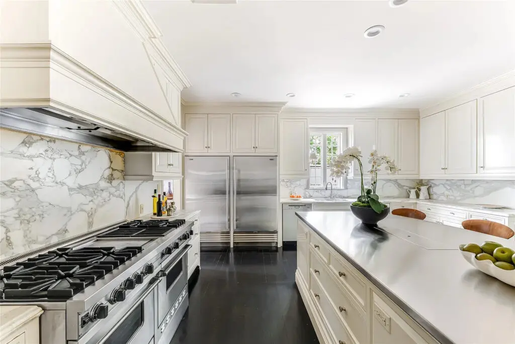 It offers all the bells and whistles, from two Miele dishwashers to Sub-Zero appliances.  (Photo by Allie Beth Allman & Associates)