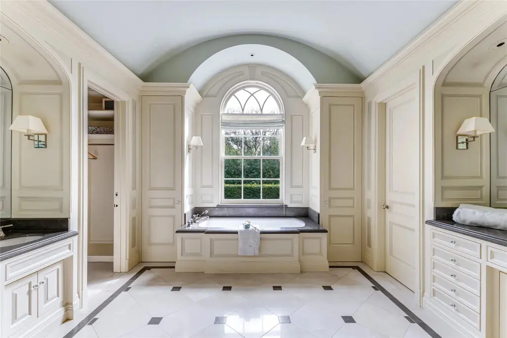 Indulge in a luxurious soak in the spa-inspired primary bath. (Photo by Allie Beth Allman & Associates)