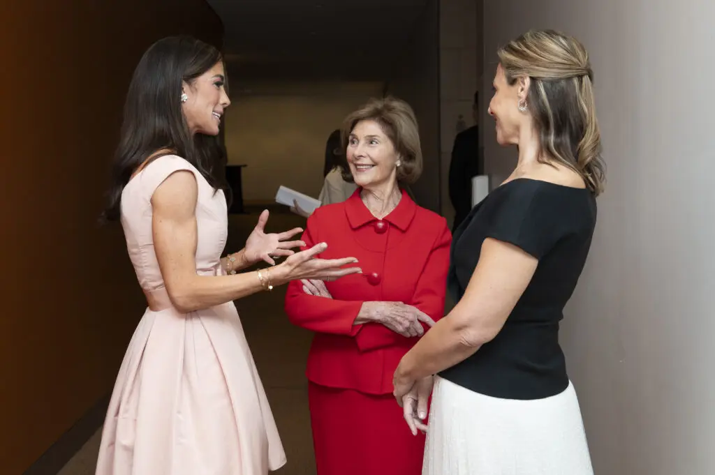Caitlin Wilson, Former First Lady Mrs. Laura Bush, and Courtney Petit chat backstage. (Photo by Tamytha Cameron)