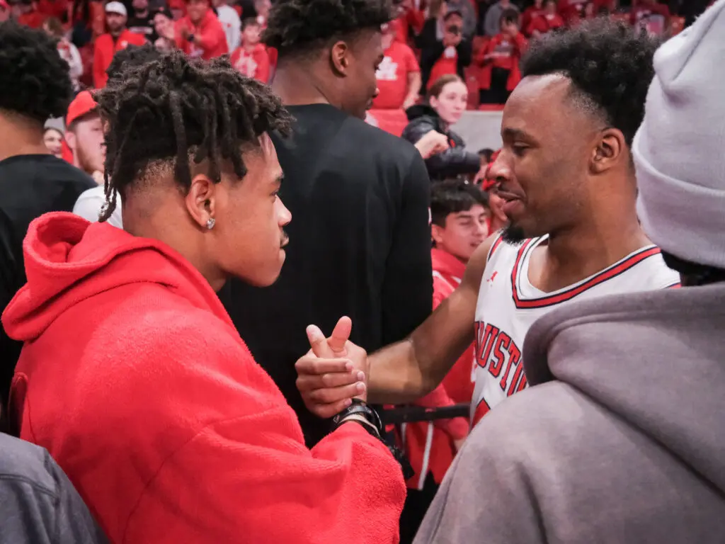 Tank Dell gave LJ Cryer plenty of love. Game recognizes game. (Photo by F. Carter Smith)