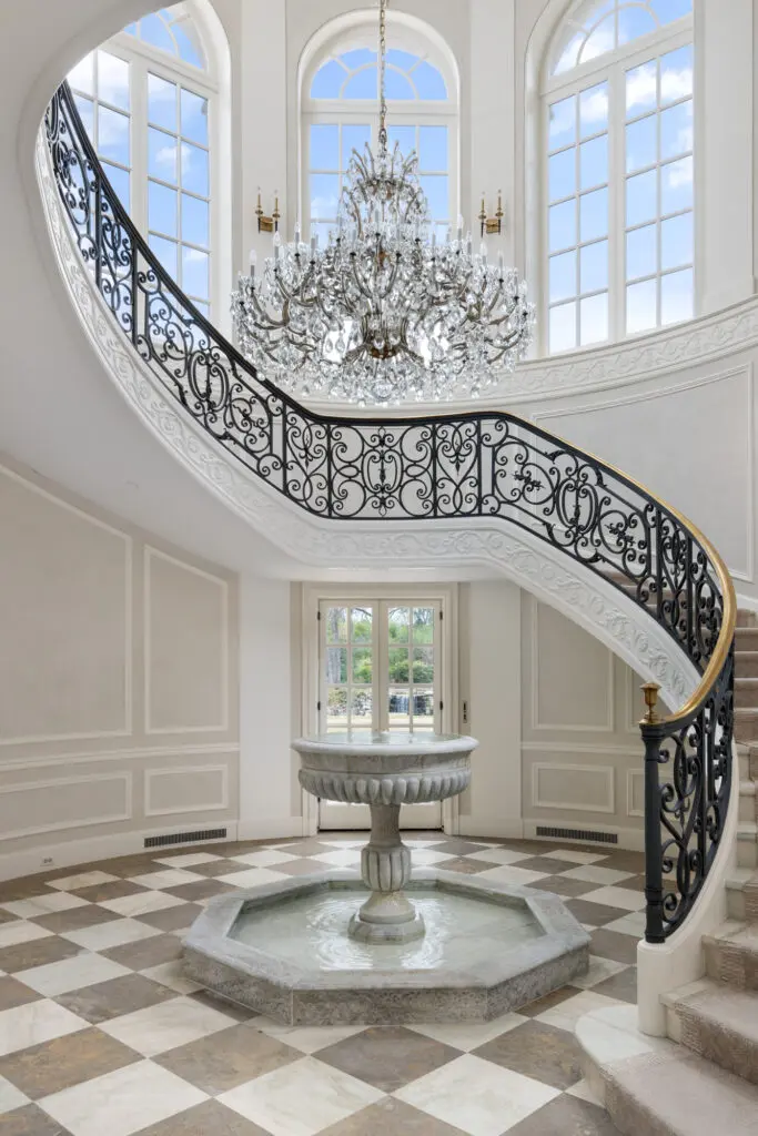 The French-style chateau "blends intimacy with grandeur." (Photo by Briggs Freeman Sotheby's International Realty)