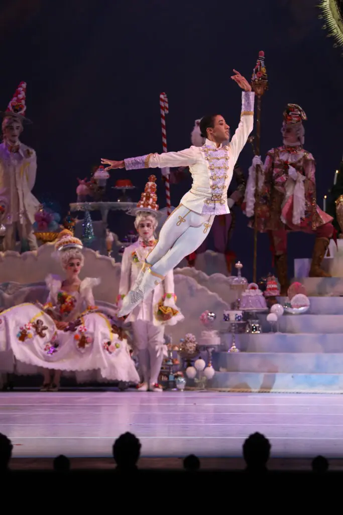 Houston Ballet First Soloist Harper Watters as the Nutcracker Prince and artists of Houston Ballet in Stanton Welch’s T'he Nutcracker.' 
(Photo by Amitava Sarkar (2019) Courtesy of Houston Ballet)
