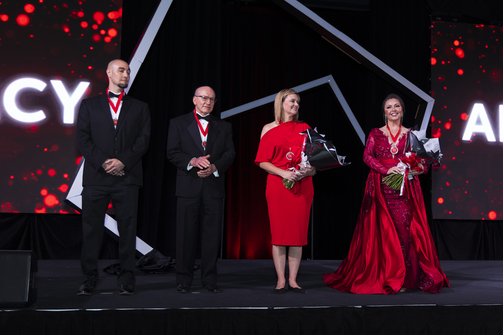 Logan Giutta, Randy Johnson, Kathleen Gilbert and Misti Jeter represent the four "chambers" of the mission of the American Heart Association: research, discovery, advocacy and equity. (Photo by 209 Photobooth Company)