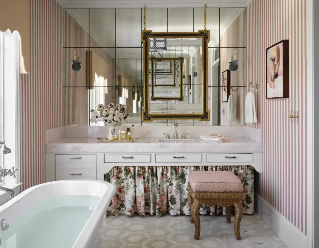 The main-bath fabric and wallpaper are Schumacher.  (Photo by Douglas Friedman)
