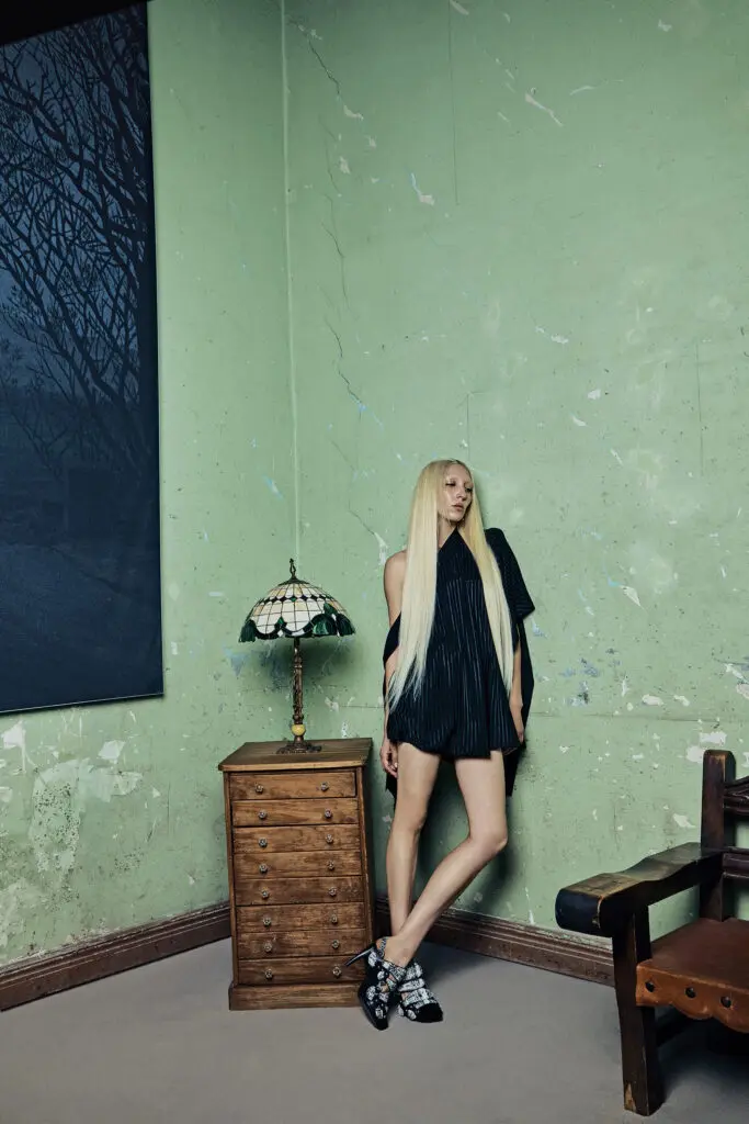 Louis Vuitton one-shoulder asymmetric dress $5,100, and Legacy slingback pump $2,010. (Photo by Bryan Flores)