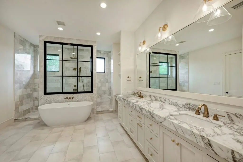 The primary bath is a serene oasis.