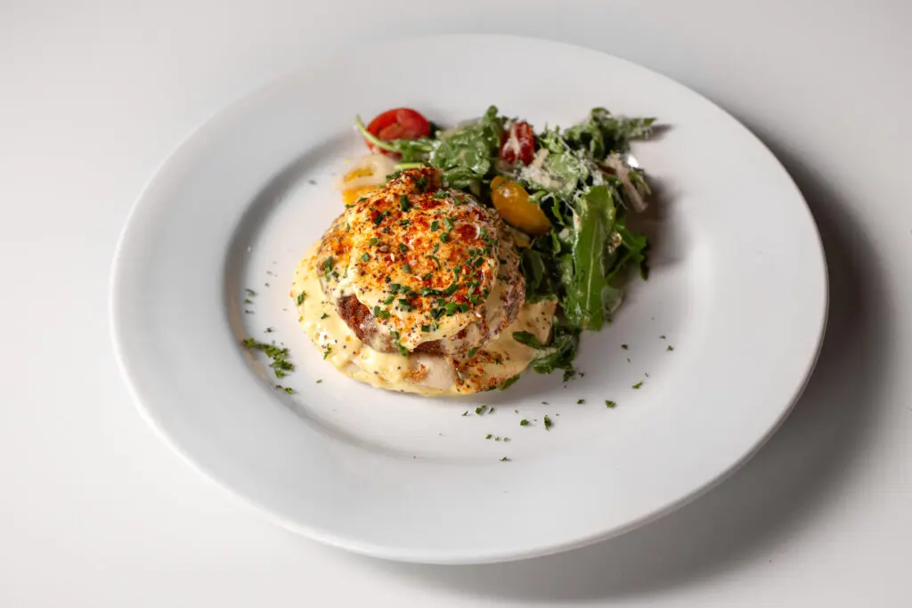 The Charlotte's new brunch menu boasts a Breakfast Benedict with choice of crab cake, smoked salmon, or bacon.(Photo by Dan Pagnett)