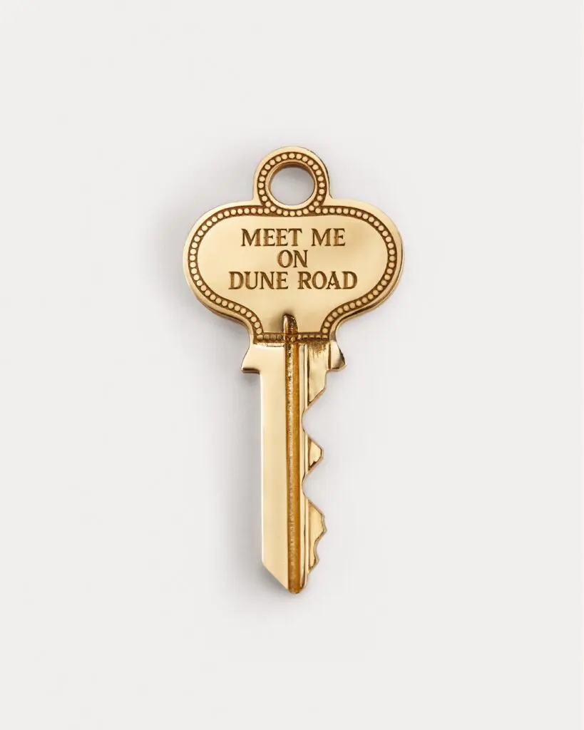 With up to five handset pave letters or numbers on one side and a “Meet Me” phrase on the other, each design is custom to the wearer.