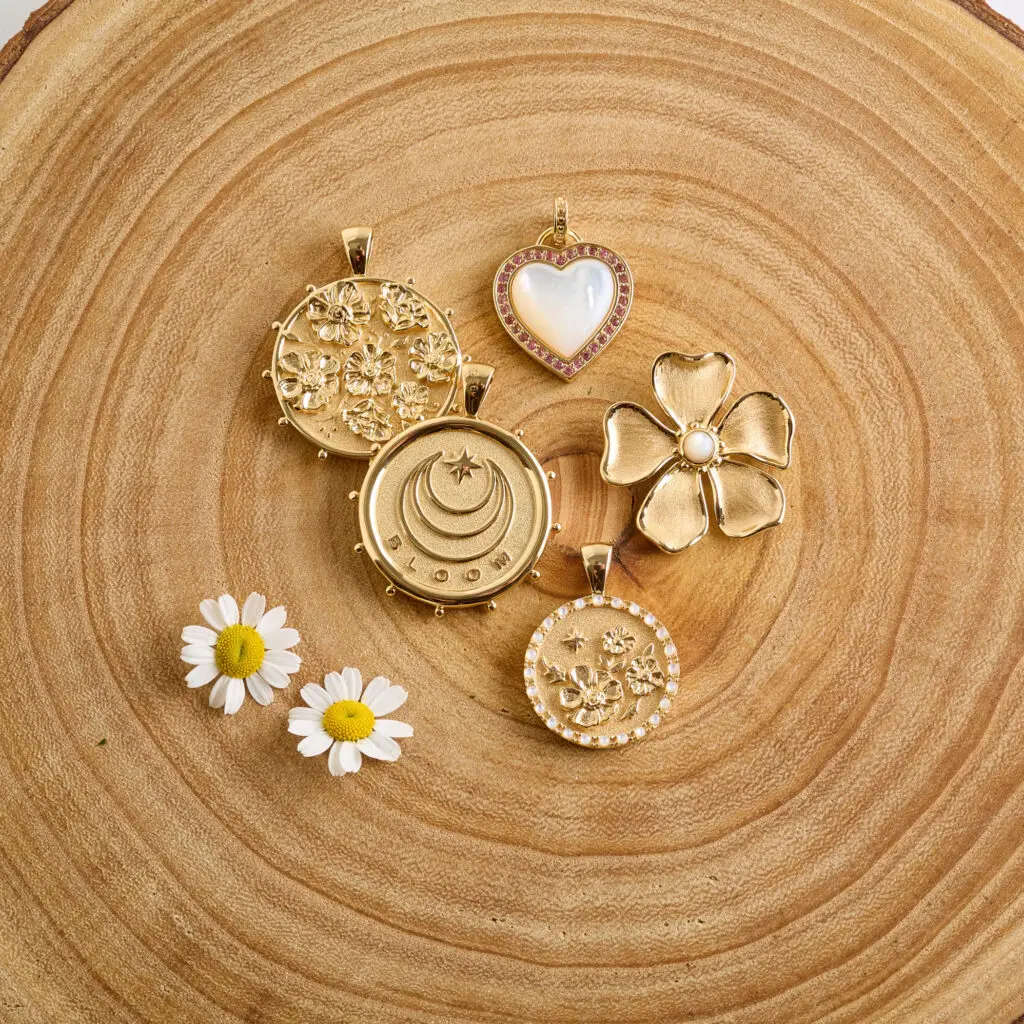 Inspired by Bush's steadfast commitment to literacy as well as by her favorite flower, the peony, the collection includes four meaningful pieces. (Courtesy)