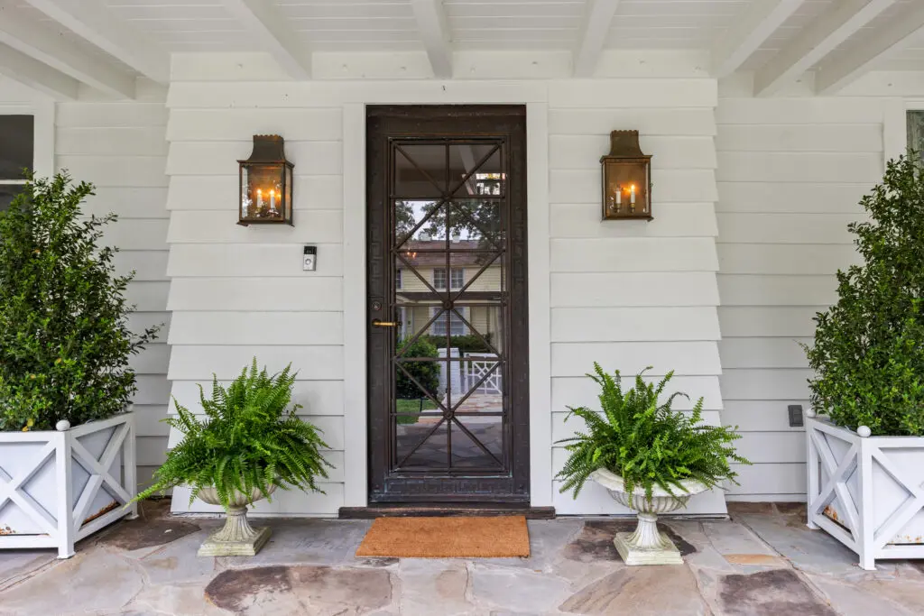 The front door, sourced from Jacqueline Kennedy Onassis’ New York apartment, was crafted by the same artisan who helped restore the Statue of Liberty. (Photo by Freeze Media FW)
