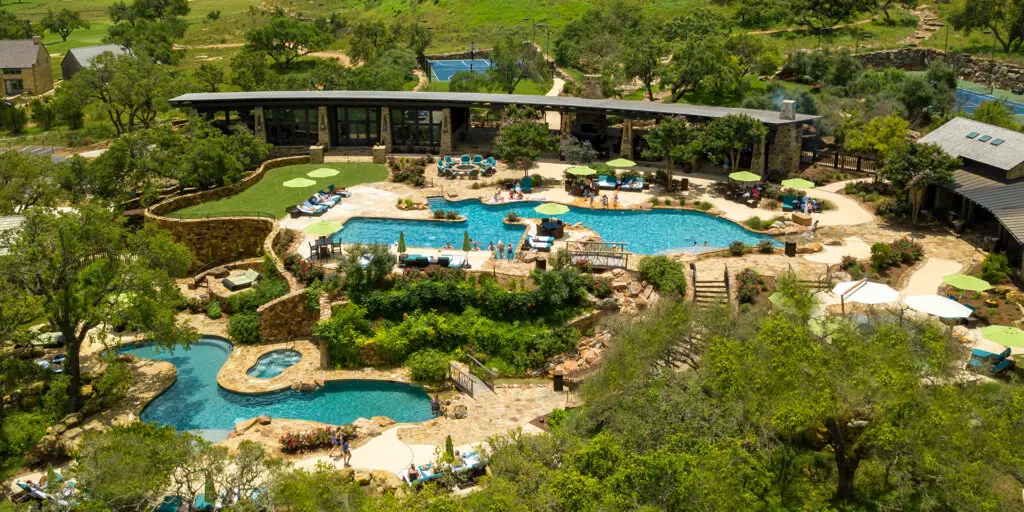 With three pools, a jacuzzi, big pavilion and newly expanded bar and grill, the Ranch Club is the center of warm-weather fun. (Photo courtesy of Boot Ranch)