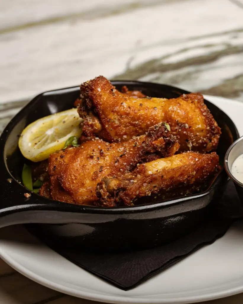 Start your meal at Winsome Prime with the truffle lemon pepper wings. (Courtesy)