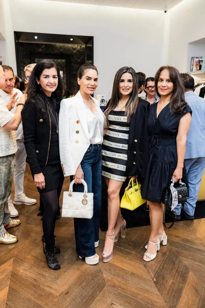 Naureen Malik, Nina Magon, Sneha Merchant, Anu Reddy at Balmain in River Oaks District saluting Operation Smile honorees. 