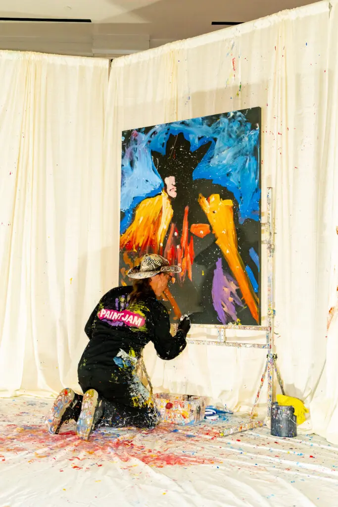 Harvey Dunn’s Paint Jam brought lightning-fast painting to the Habitat for Humanity gala at The Woodlands Waterway Marriott. (Photo courtesy Habitat for Humanity MCTX)
