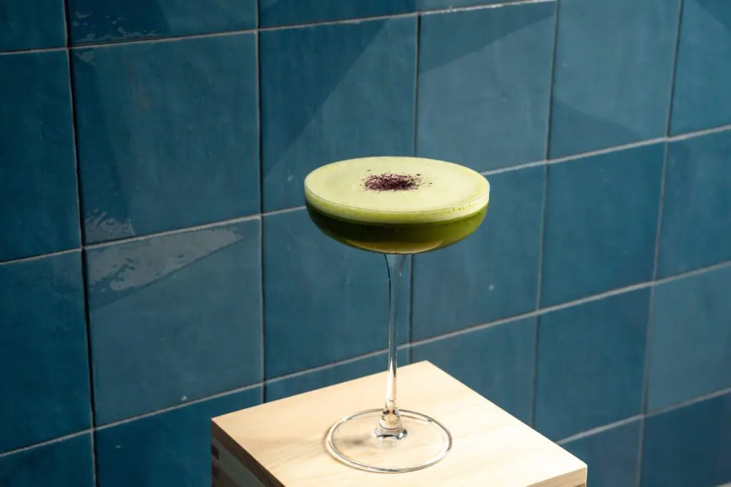 The “Ai” affection is a beautiful (and delightful) matcha cocktail blended with Calpis (a sweet and tangy Japanese fermented milk drink) with yuzu marmalade and the foam of a beaten egg white, topped with a seasoning blend called Kyushu at Bar Doko. (Photo by Michael Anthony)
