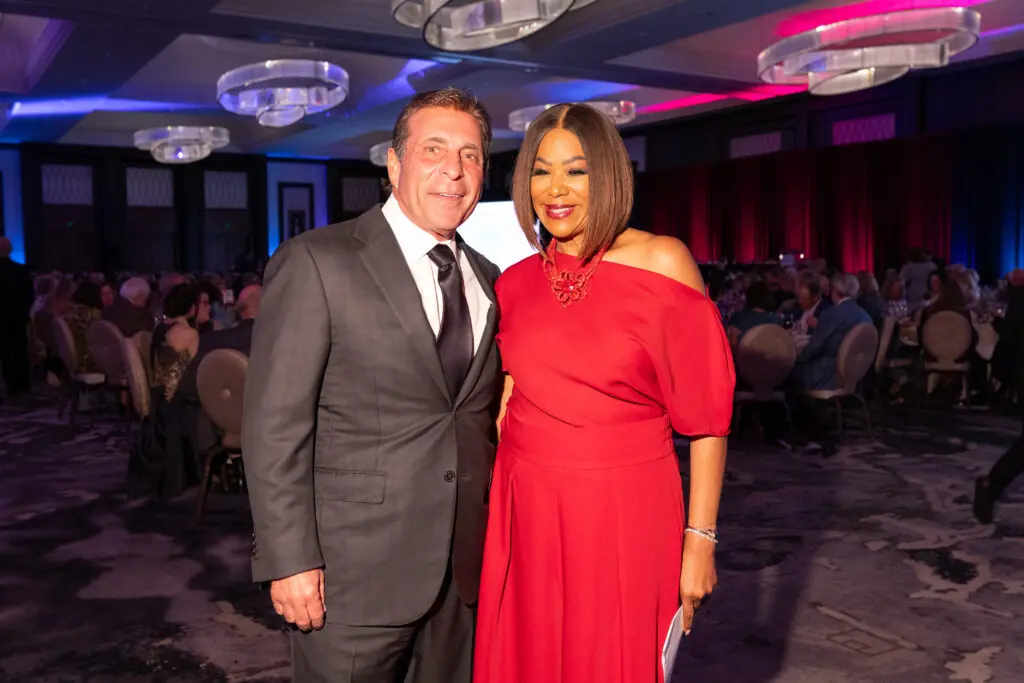 Honorary chair Johnny Carrabba, emcee Deborah Duncan at the Brookwood gala
