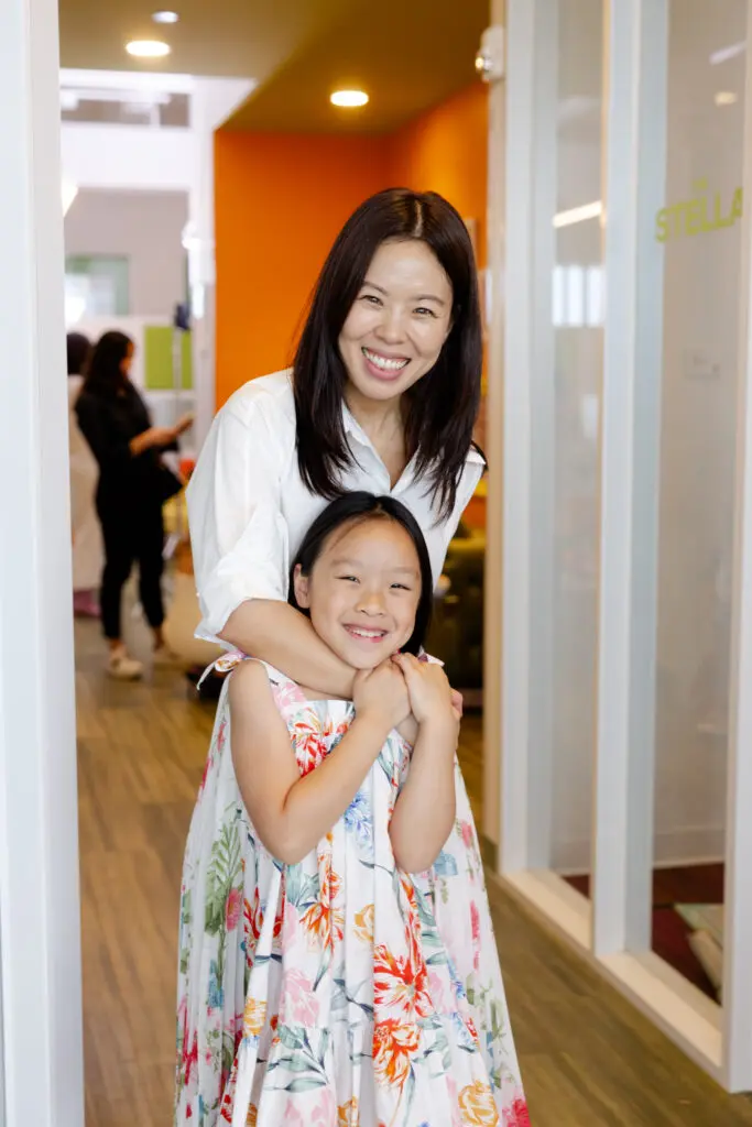 Designer Kristy Lynn Lee with a young bestie  at the SheSpace 'Mommy & Me' fashion show (Photo by @LaurenHolubPhotography)