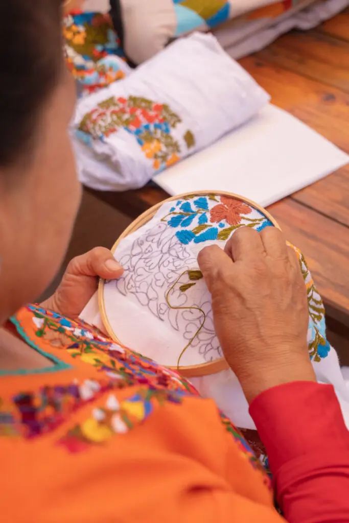 Lynch and Steen traveled to Oaxaca, Mexico to photograph the collection in the place where skilled artisans hand-embroidering each piece. (Photo by Dalí Nelio)