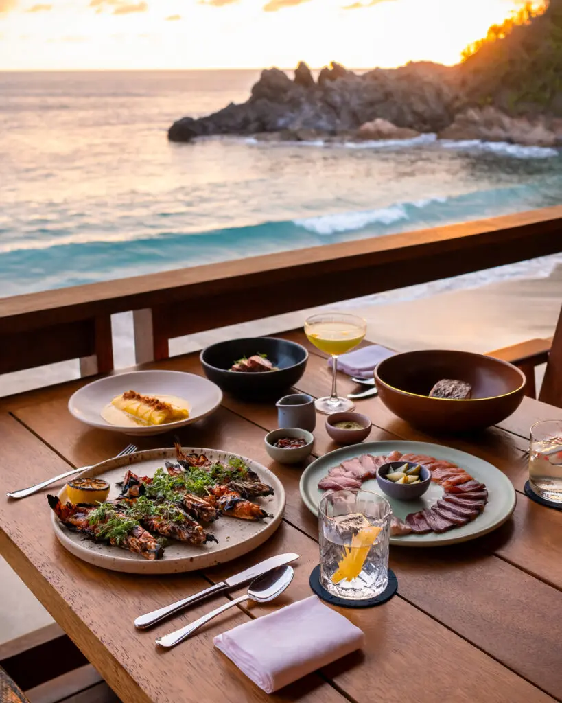 Sal restaurant's mouthwatering seafood menu brings innovation to the ocean-to-plate concept, served in a beachside open-air dining room perched above the waves.  (Photo by Four Seasons Tamarindo)