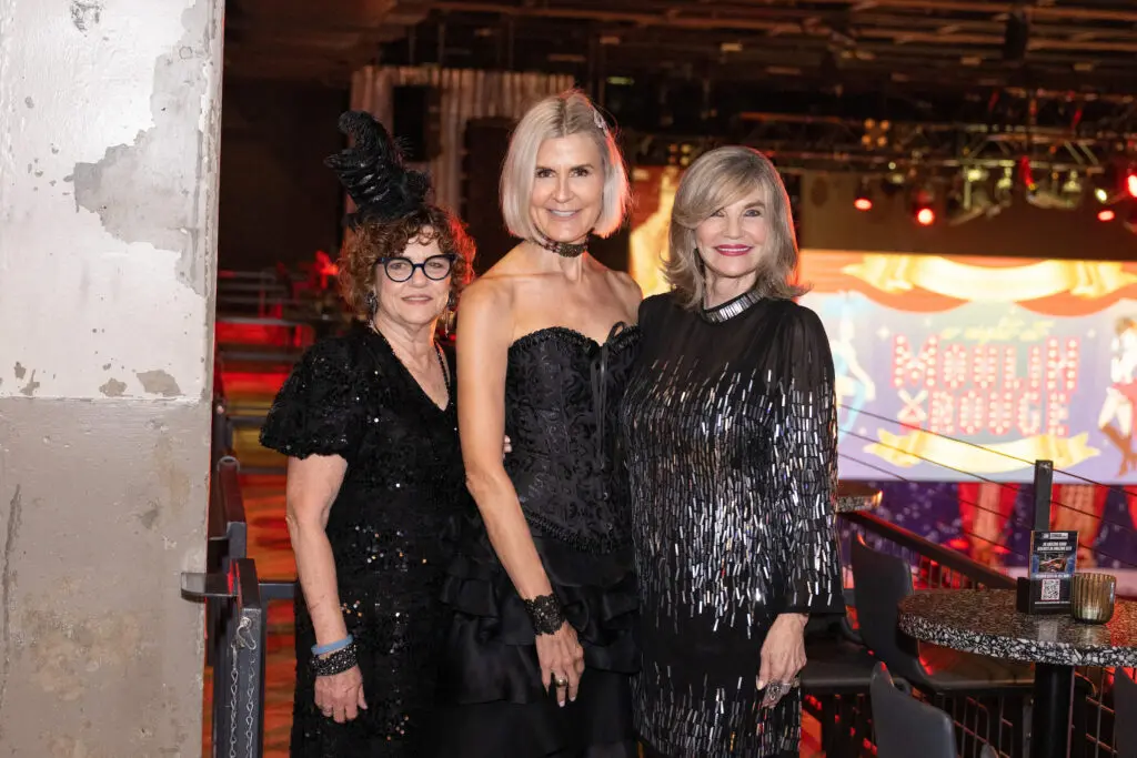 Karen Petlz, Krista Borstell, Diane Watson Caine at Victory's 'A Night at the Moulin Rouge' gala (Photo by Wilson Parish)