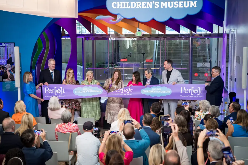 Katherine Stenesen, Christopher J. Durovich, Sarah Scholl, Francie Anne Moody-Dahlberg, Suzanne Perot McGee, Dr. Linda Silver, Forrest Hoglund, Peter Slavenburg, and Mike Spiewak at the ribbon-cutting ceremony (Photo by Kelly Alexander Photography)