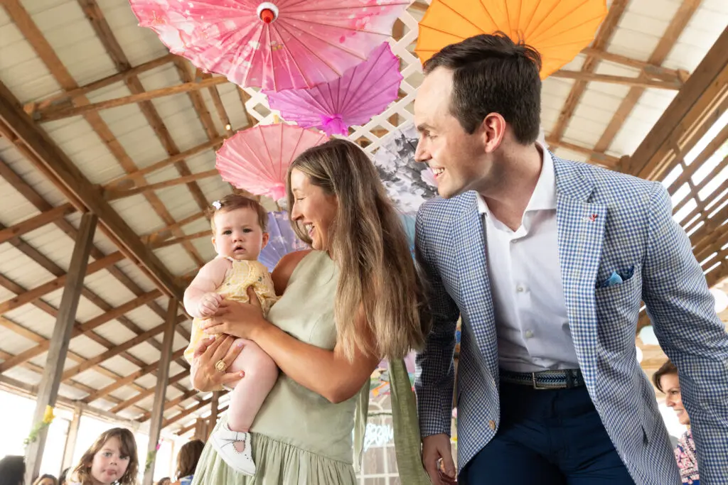 Baby Merritt Leever with parents Brook & JT Leever at Recipe for Success Fashion in the Fields  (Photo by Michelle Watsoh)