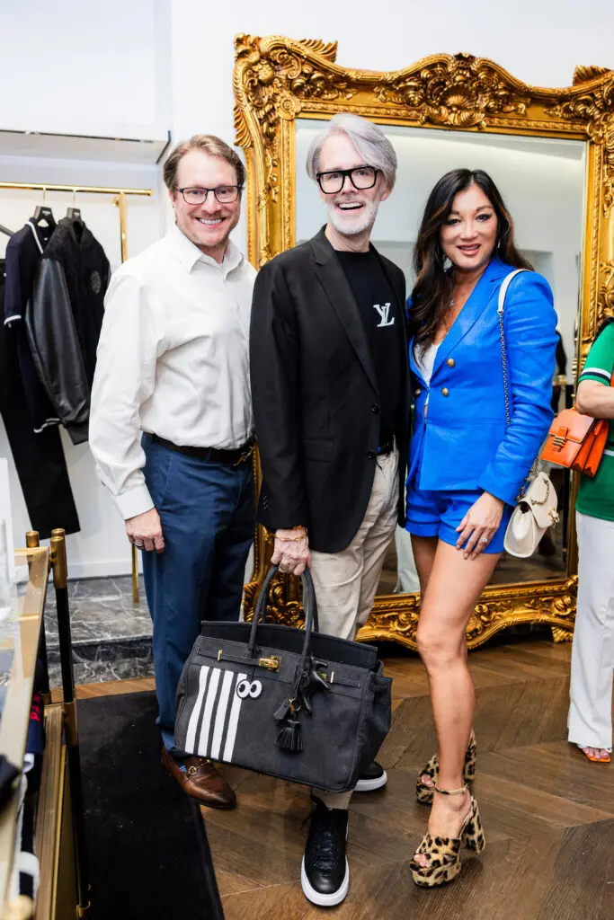 Matt Burrus & Michael Pearce, Angela Nichols at Balmain in River Oaks District saluting Operation Smile honorees. 