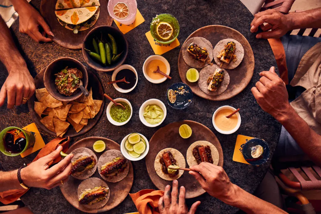 Nacho Taqueria's poolside Taco Tasting experience explores Mexico's regional variations, from Baja's Tempura Lobster to Jalisco's Birria, paired with local beverages.  (Photo by Four Seasons Tamarindo)