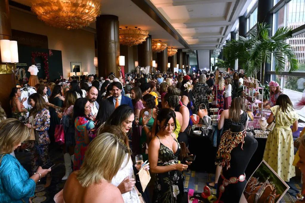 Shopping the marketplace at the Latin Women's Initiative annual luncheon (Photo by Dave Rossman)