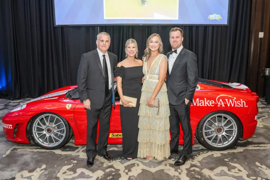Tony & Laurie Nevotti, Sarah & Hunter Nevotti at the Make-A-Wish ball (Photo by Jacob Power)