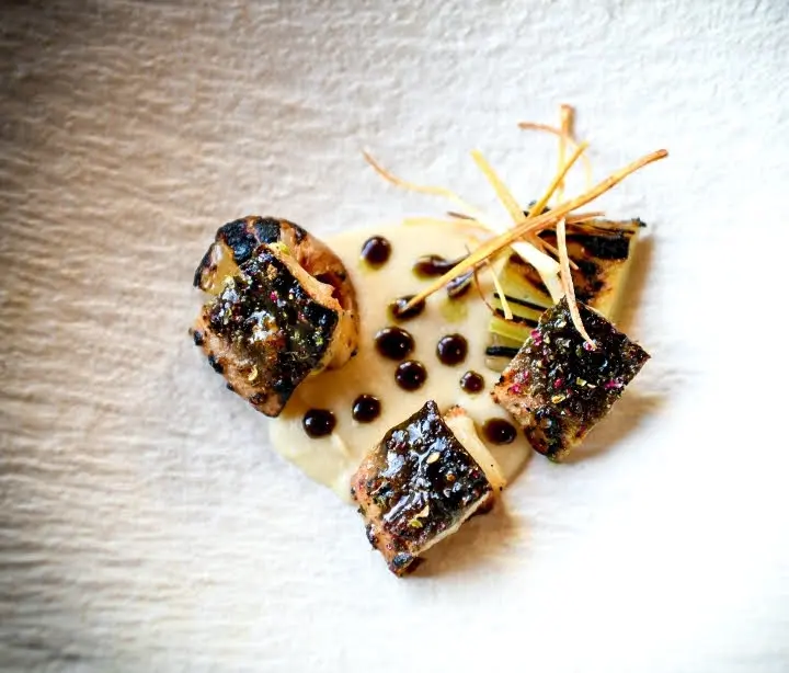 Chef Casey LaRue will open Sauvage, a wood-fire omakase experience, in a suite with street access off of Commerce Street at The Statler. (Courtesy)