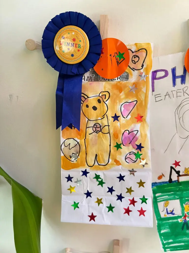 Sasha Chesnokova, a first grader at Lamar Elementary in Conroe ISD, designed this winning bag for to-go orders. (Photo courtesy Phat Eatery)