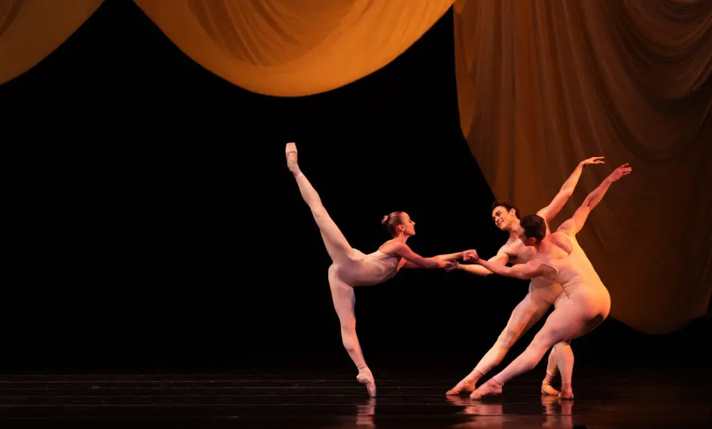Houston Ballet first soloist Tyler Donatelli, soloist Aaron Daniel Sharratt, and Corp de Ballet dancer Riley McMurray in Ben Stevenson’s “Four Last Songs” (Photo by Amitava Sarkar. Courtesy Houston Ballet.)