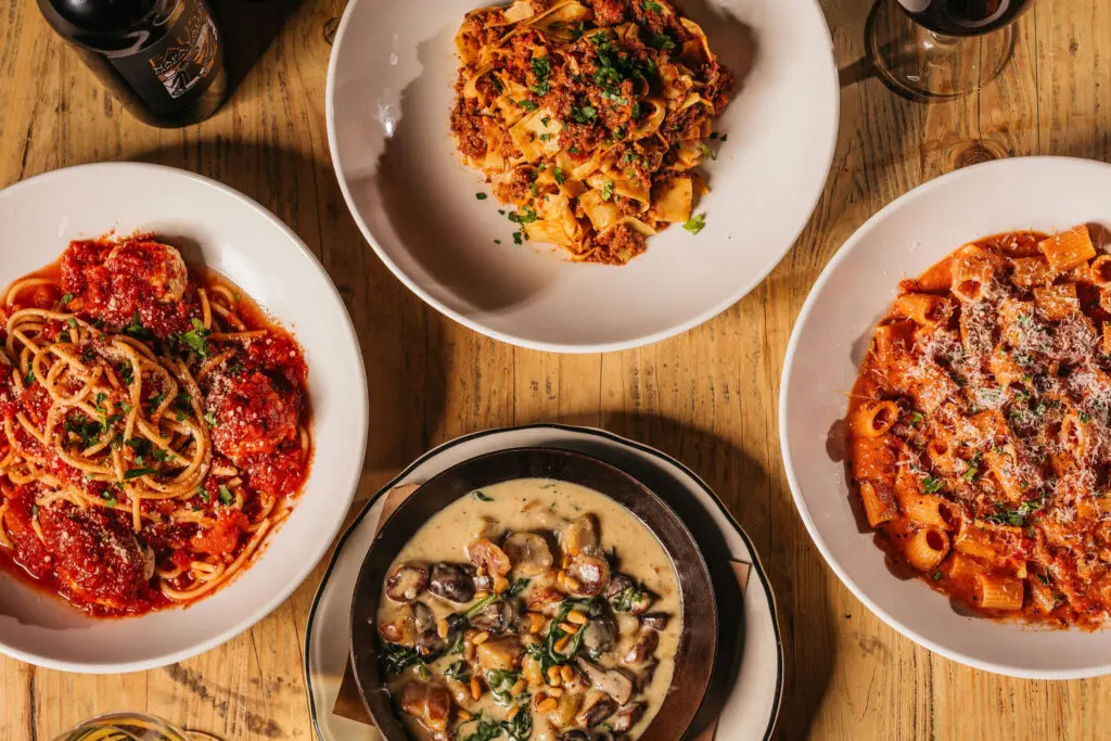 In addition to pizzas, on the scratch-made Pie Tap menu you’ll find an selection of snacks, sandwiches, salads, pastas, rotisserie chicken, mains, and desserts.