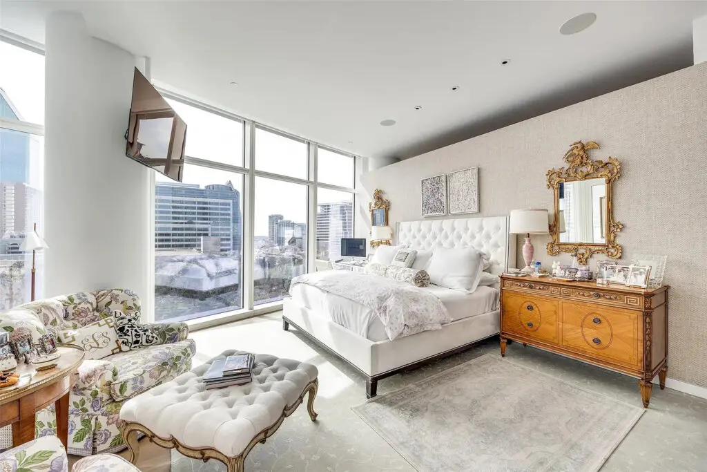 The listing describes the unit's "elegant and timeless details" as "striking, transitional, and warmly welcoming." (Photo by Compass RE Texas)