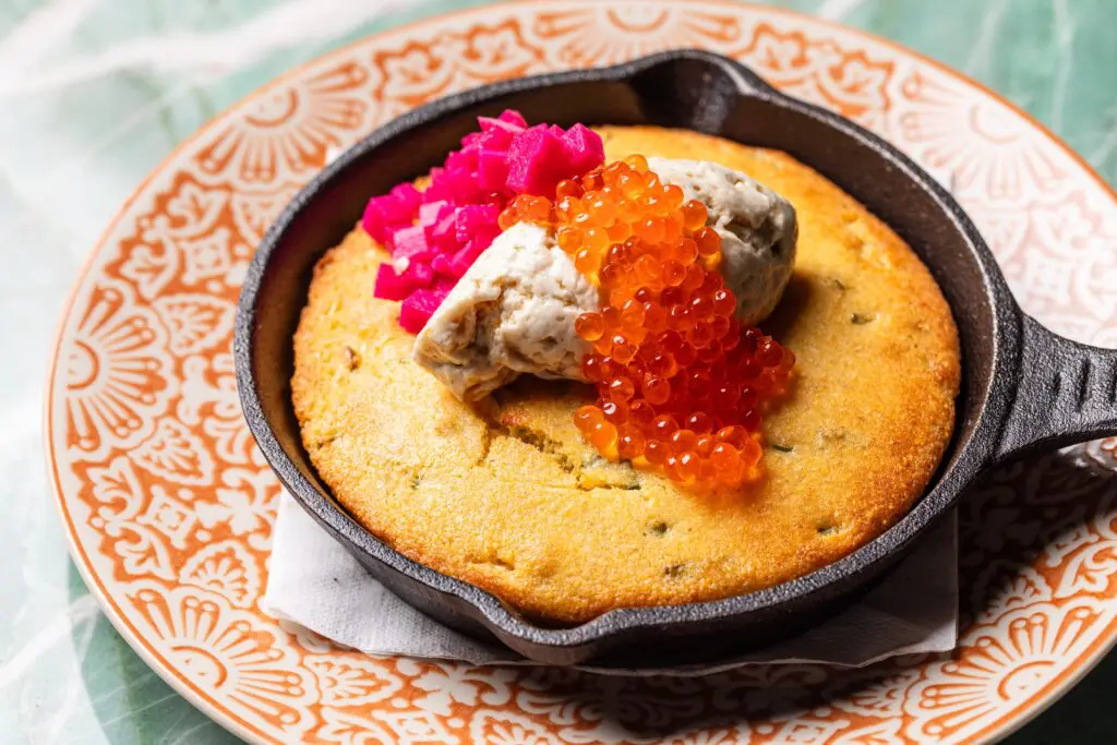Cast Iron Cornbread with Steen’s Cultured Butter, Radish, Pickled Turnip and Smoked Trout Roe at Good God, Nadine’s